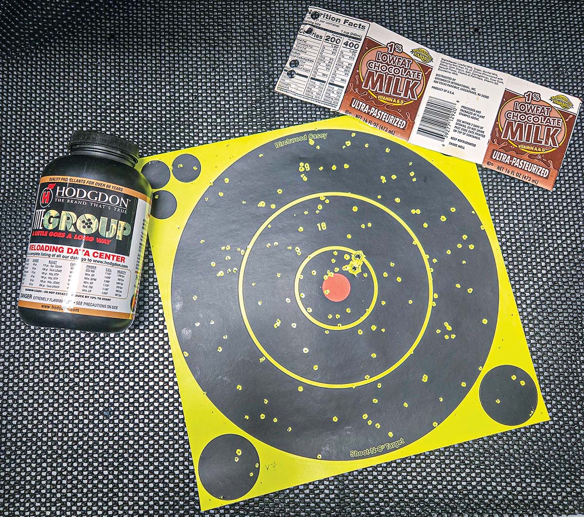 Thanks to the low fat wads, this load still packs a fat punch even at a distance of 15 feet. While the density and pattern opens up quite a bit at this distance it is still effective, and since this load cycles the action reliably, a follow up shot is easy and quick – as can be seen from the two holes from Hornady Critical Duty rounds penetrating the paper.
